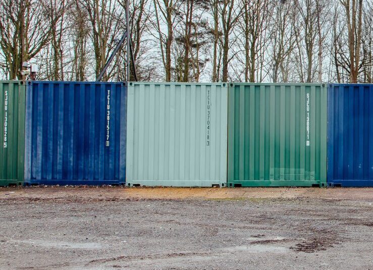 Green and blue containers in a row