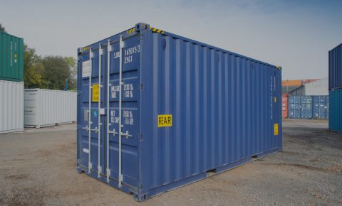 Blue container on gravel rear view doors closed