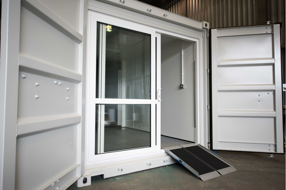 container with ramp and glass sliding door