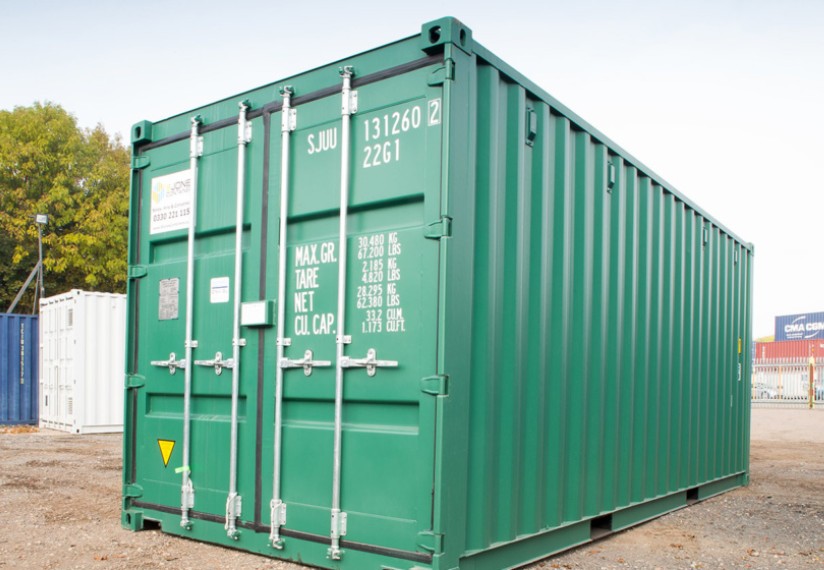 20ft green container on gravel courtyard