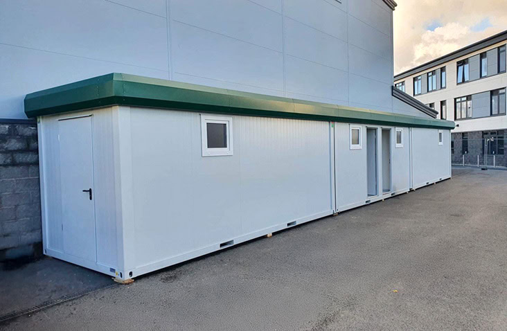 Modular changing room unit for staff welfare facilities with secure access and private space for construction and industrial sites.