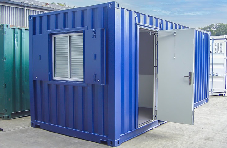 A 20ft blue container office unit with a secure door and shuttered window, providing a durable, portable, and weather-resistant workspace solution.