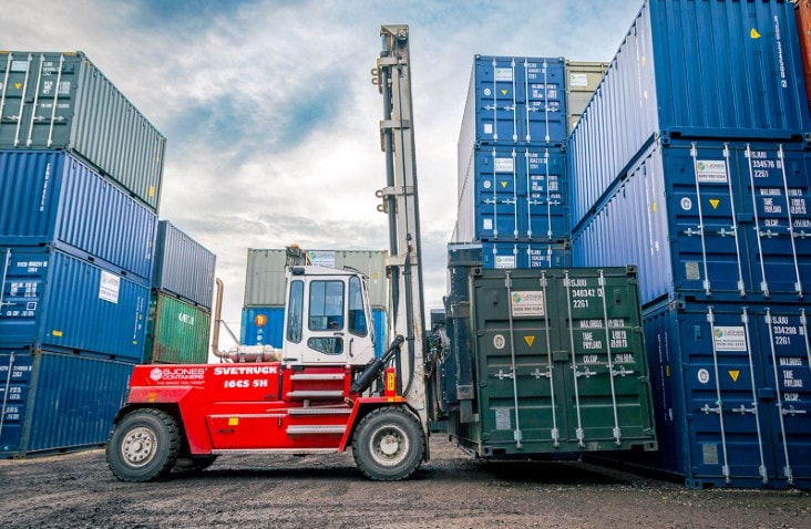 S Jones Containers forklift truck moving shipping containers at the Aldridge, Walsall depot for container hire, sales, and storage