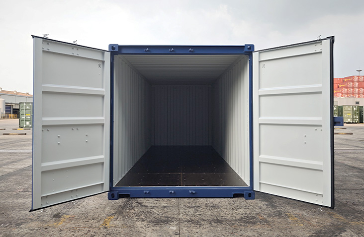 Open 20ft shipping container with double doors fully opened, showing clean interior and new flooring, ideal for secure storage and container hire or sales in industrial environments.