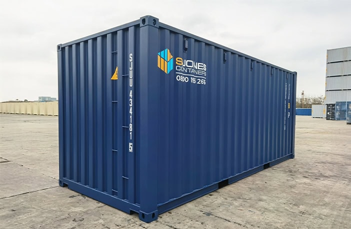 20ft blue shipping container viewed from the back corner, showing side wall and rear corrugated panel.