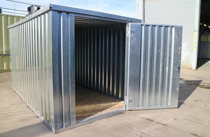 Open galvanised flat pack steel storage unit with a single door, showing spacious interior for secure storage
