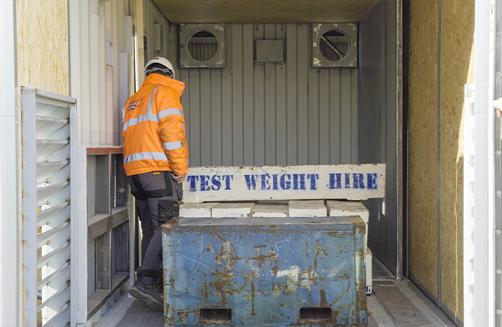 Load Testing Using Containers How Much Does a Shipping Container Weigh? | S Jones Containers