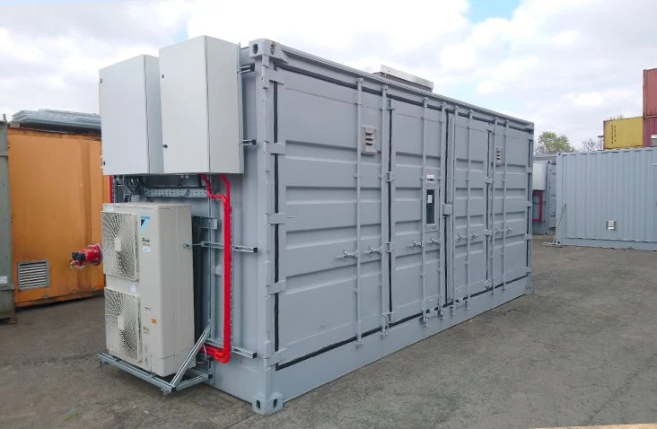 Side-opening battery storage enclosure with integrated HVAC and electrical safety systems, designed and manufactured by S Jones Conversions.