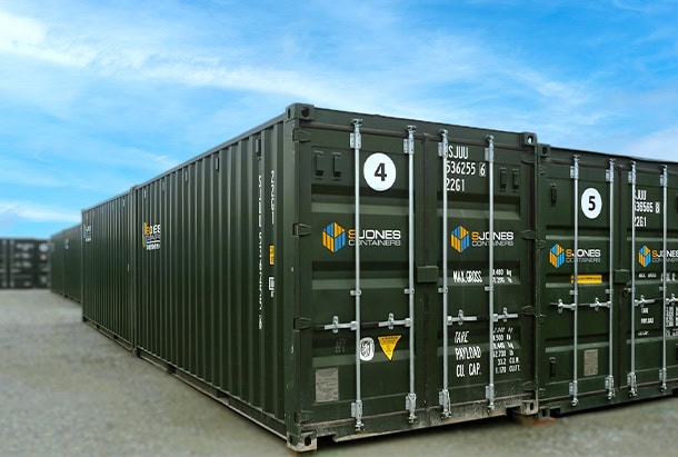 Rows of green SJUU (S Jones Containers) shipping containers installed as an external self-storage facility at Anglesey Golf Course. 39 containers helped a golf course diversify its land use and create a new revenue stream through secure storage for domestic and business customers.